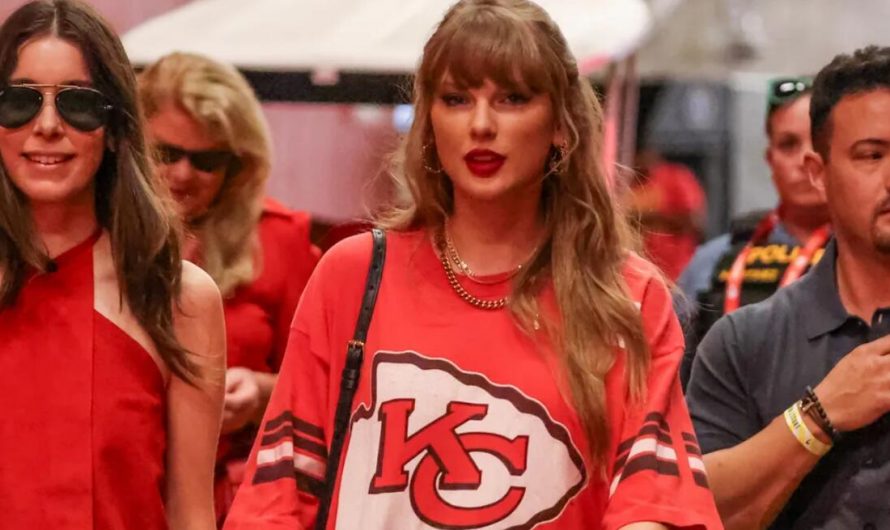 Taylor Swift Styles an Oversize Chiefs T-Shirt Like a Mini Dress With Classic Black Boots